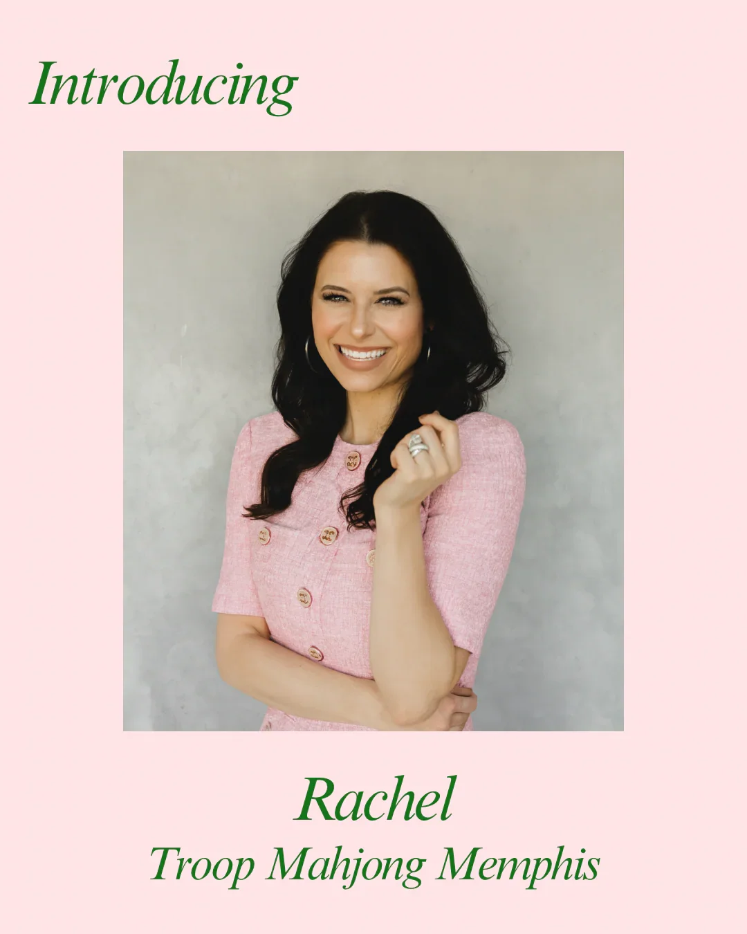 A woman with long black hair wearing a pink dress with gold buttons, smiling and posing with her right hand holding her hair and her left arm crossed. Text on the image includes 'Introducing Rachel Troop Mahjong Memphis'.