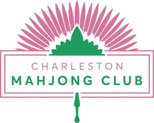 Logo for Charleston Mahjong Club with a pink and green color scheme, featuring pink fan-like design and a green mahjong tile.