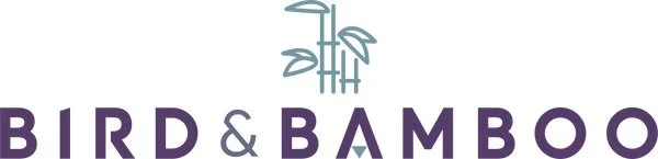A logo with the text "Bird & Bamboo" and an illustration of bamboo and leaves above the text.