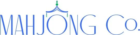 Logo of Mahjong Co. with stylized pagoda above the text.