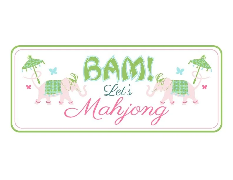 A colorful banner with two pink elephants wearing green checkered blankets, green umbrellas, and small butterflies, with the text "BAM! Let's Mahjong" in playful fonts.