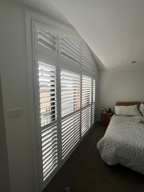 Raked Shutters on top of hinged Shutters