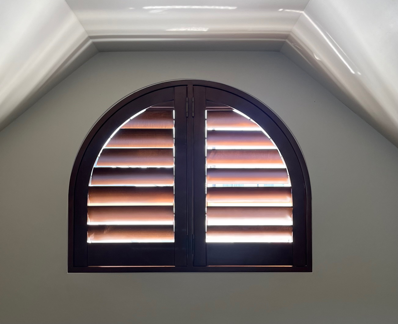 Arch Shaped Shutter in Stained Basswood Timber