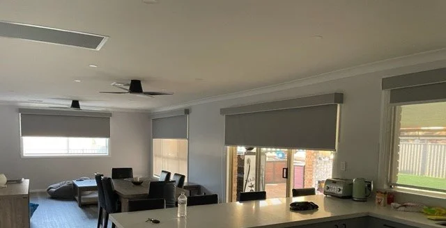 Dual Roller Blinds with Pelmets in Lounge Room