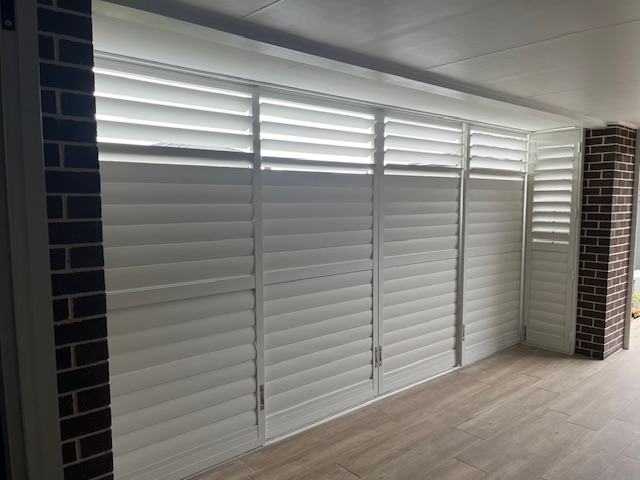 Sliding and Hinged Aluminium Shutters with mitred corners, Hidden tilt bars and has split tilt option also