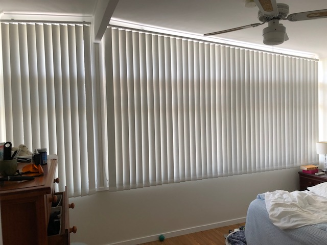 Raked Shaped Vertical Blinds to suit any window or door