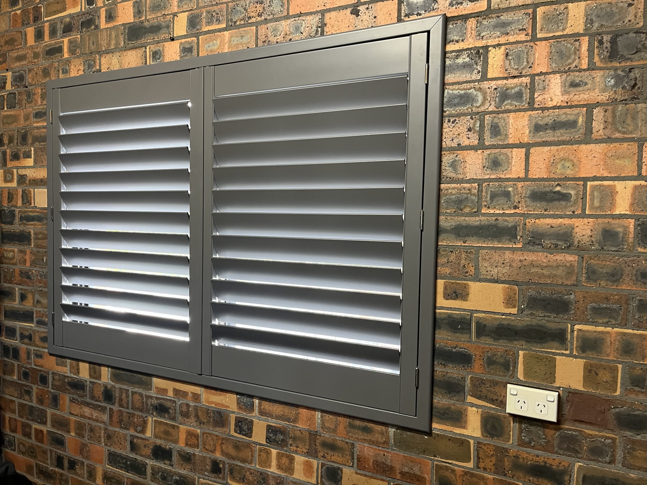 Ecosmart Shutters in Pebble Colour with Z Frame