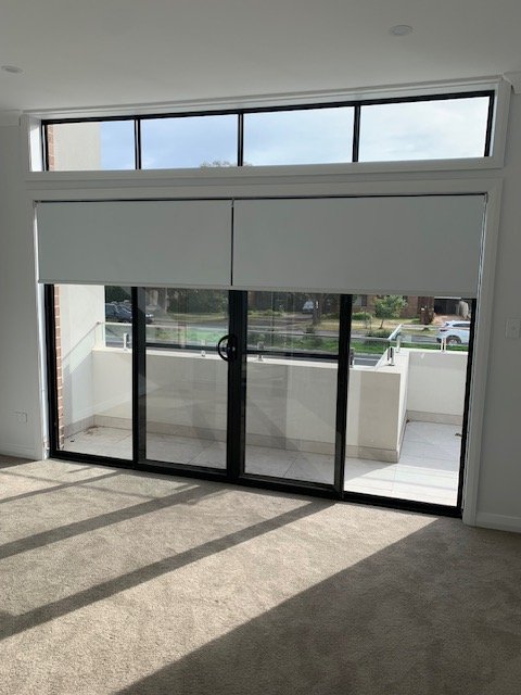Butting Roller Blinds fitting within the recess on a sliding door