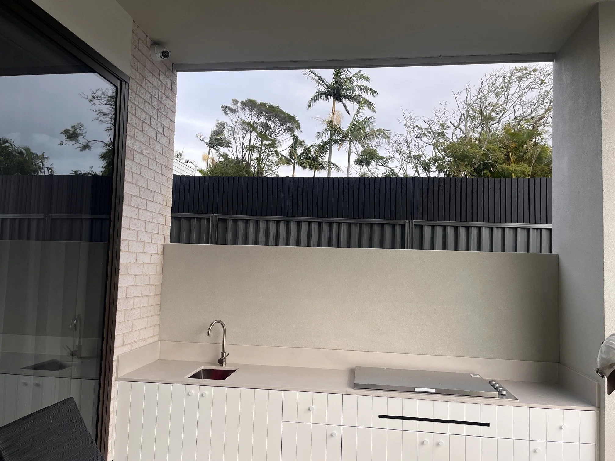 Outdoor kitchen area in Wilton before installation of aluminium shutters