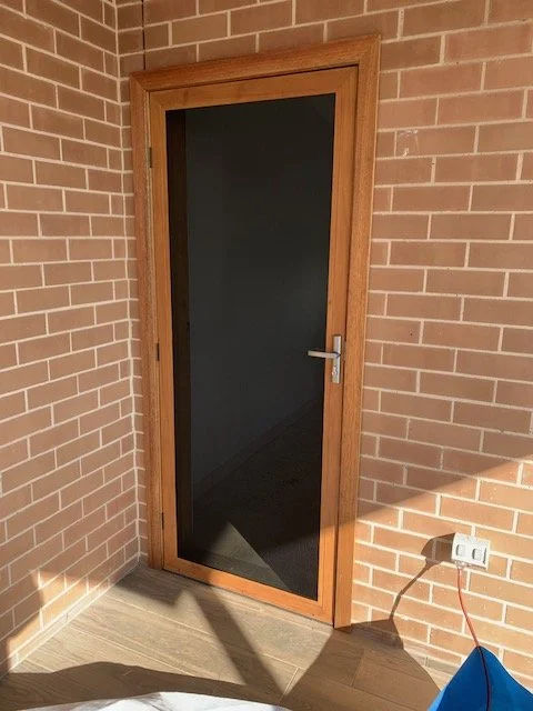 Hinged Supascreen Security Door in Western Red Cedar Woodgrain Colour
