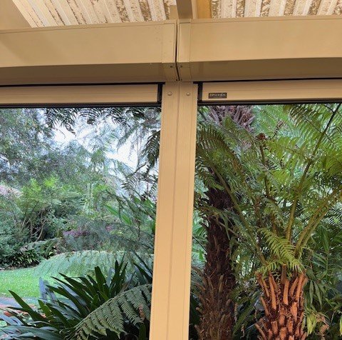 Two Zipscreen Awnings Classic Cream Colour Butting Side by Side on One Timber Post