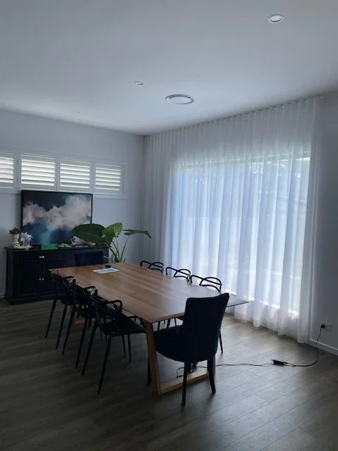 Sheer Curtain in Dining room with Plantation Shutter