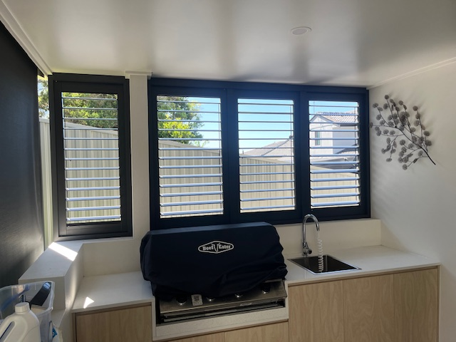 Standard Black Shutters to protect your outdoor area from the wind and rain