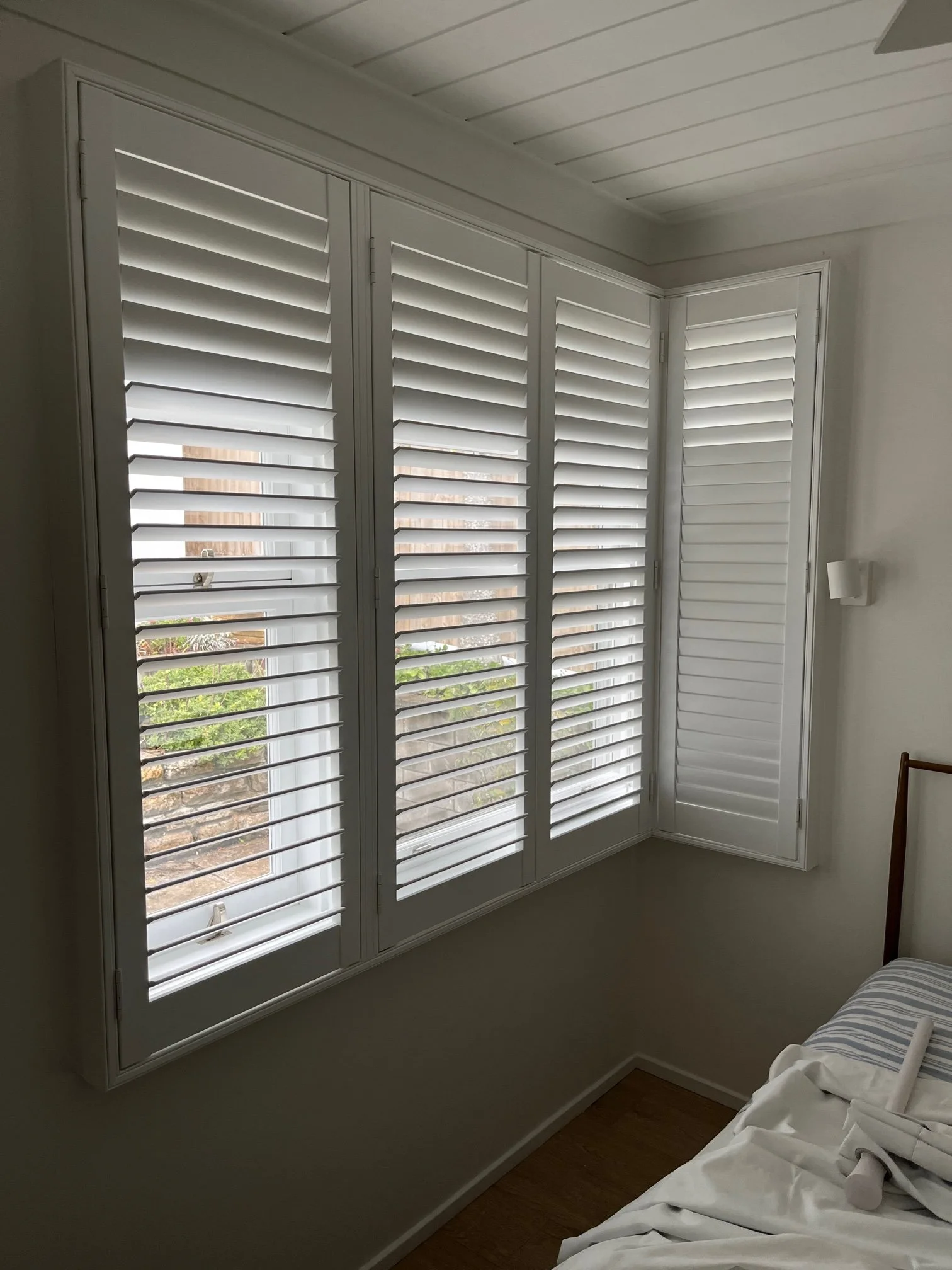 Plantation Shutters with 90° Corner Post & Smaller 64mm Louvres