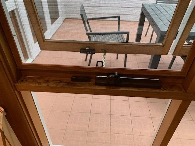 Flyscreen in Woodgrain colour with winder plate to suit wind out windows