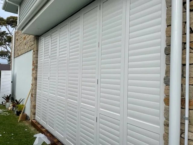 Bi-Fold Outdoor Shutters in closed poistion
