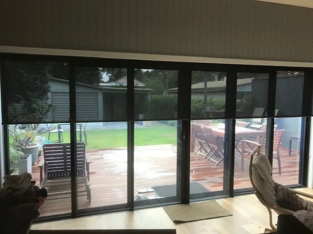 Black Sunscreen Roller Blinds in Kleenscreen Charcoal fabric
