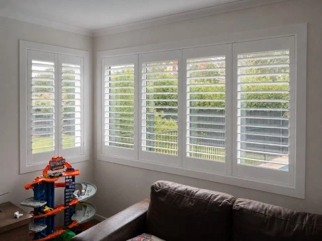 AI plantation shutter concept preview for a Camden living room