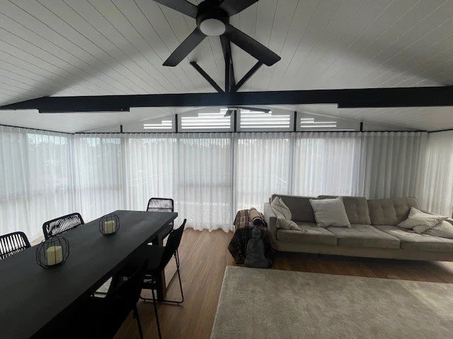 Sheer S-Wave Curtains with Plantation Shutters above