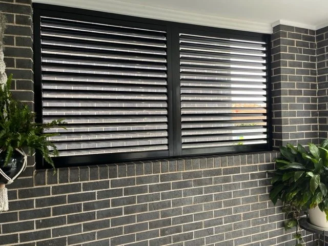 Black Outdoor Shutters for privacy and to keep insulate your home