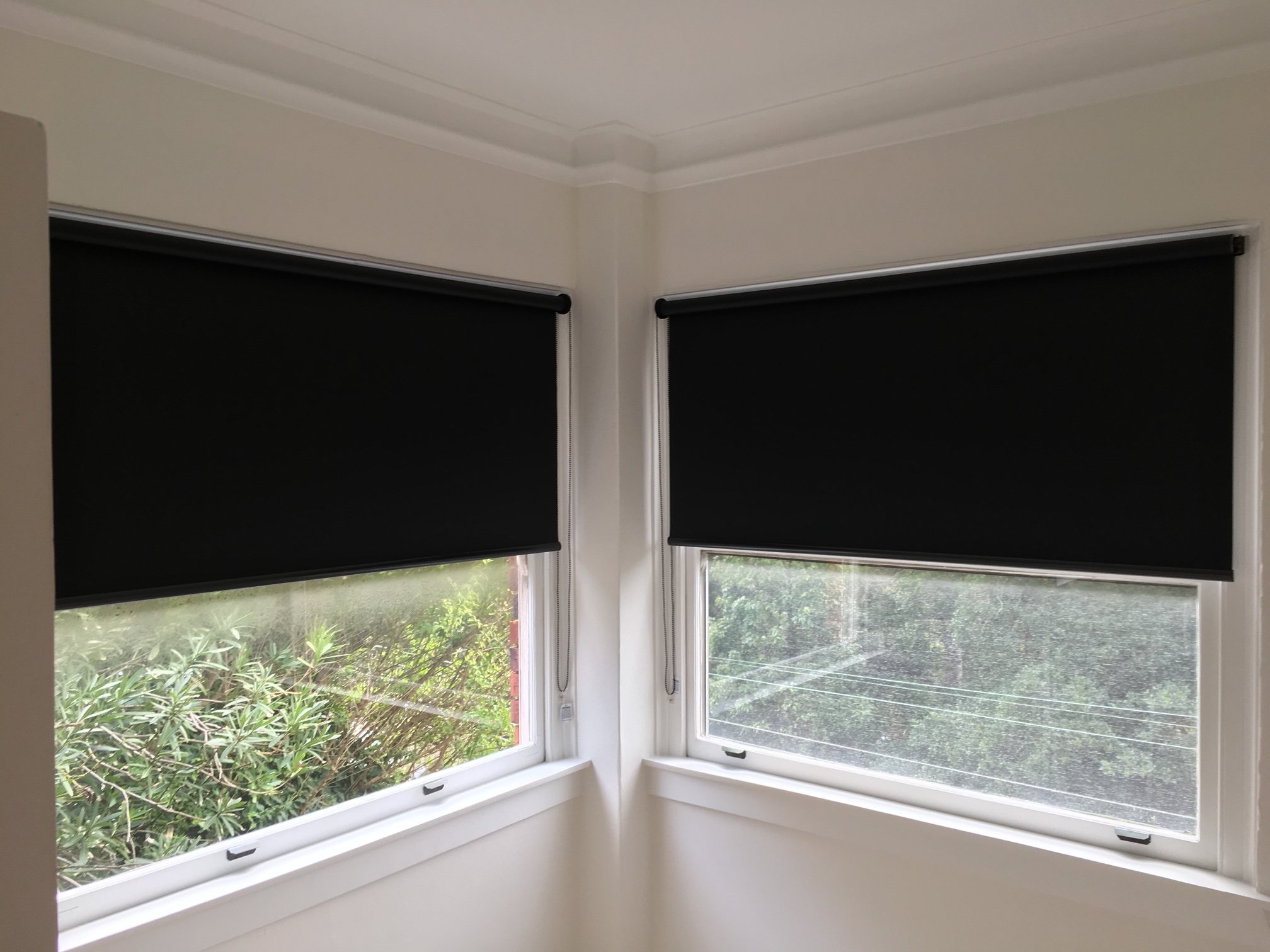 Black Roller Blinds in a Campbelltown Bedroom