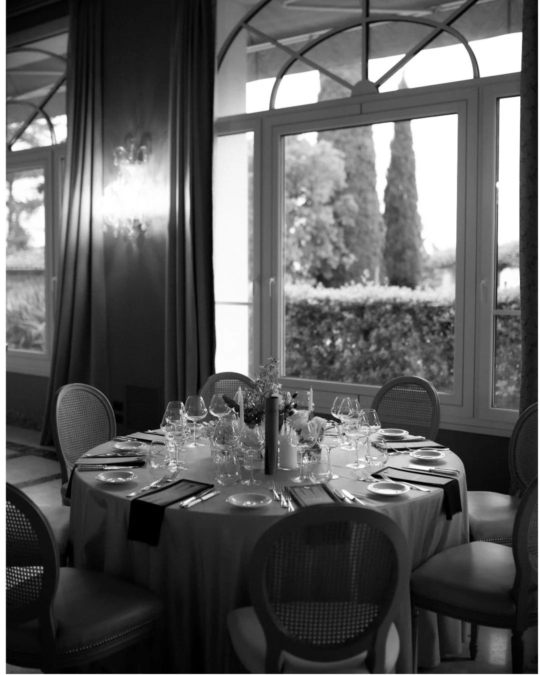Luxury table decoration with flowers and fine details in Italy villa