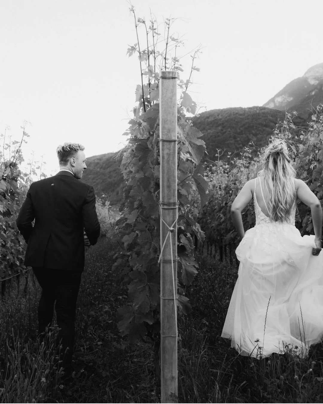 Intimate moment between bride and groom at romantic wedding
