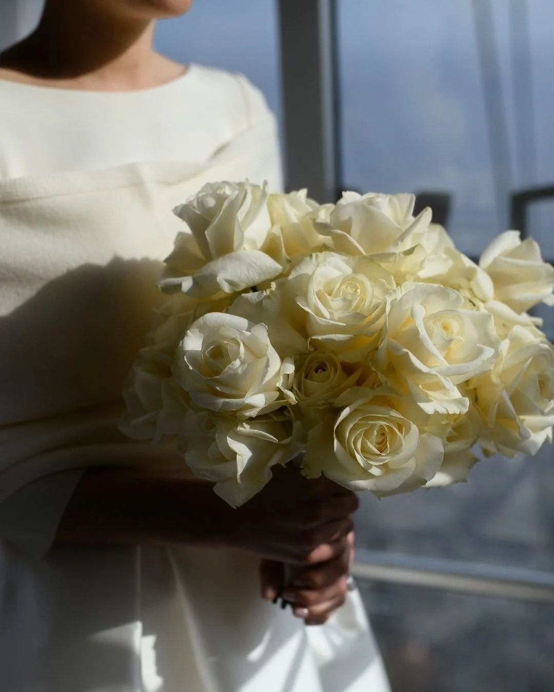 Romantic wedding bouquet with soft natural light and floral details