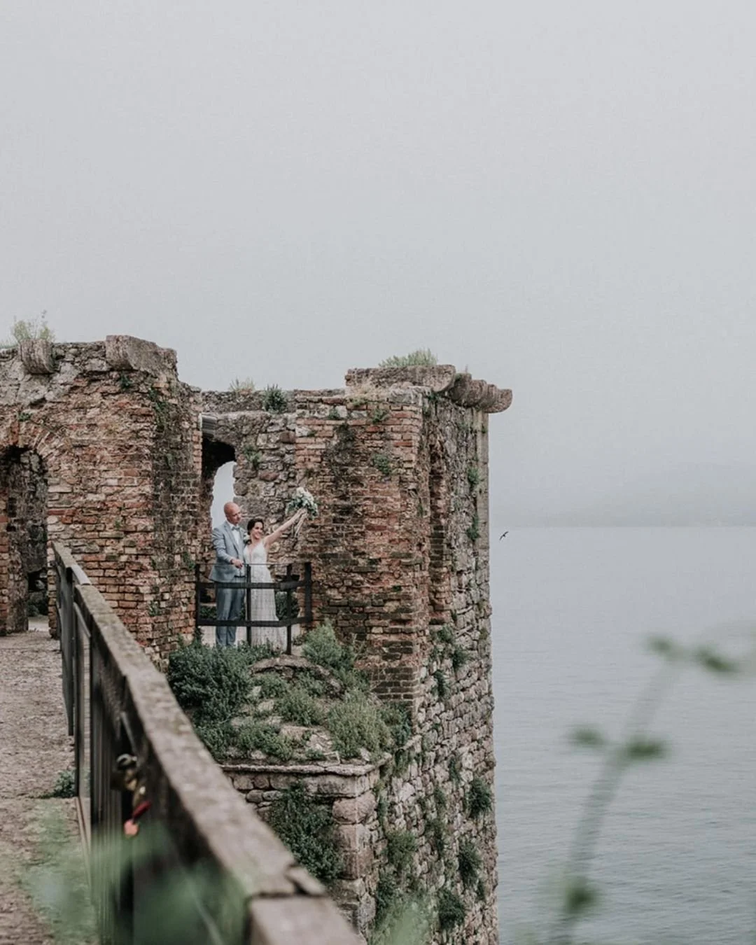 Happy couple celebrating luxury destination wedding in Italy