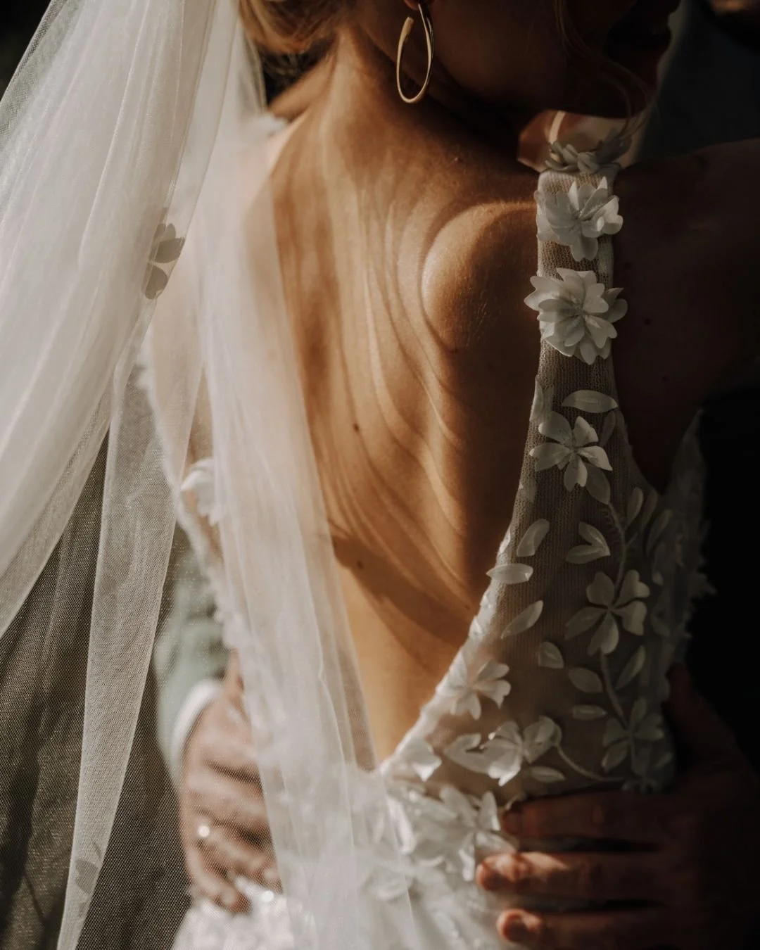 Detail of elegant wedding dress fabric in soft natural light