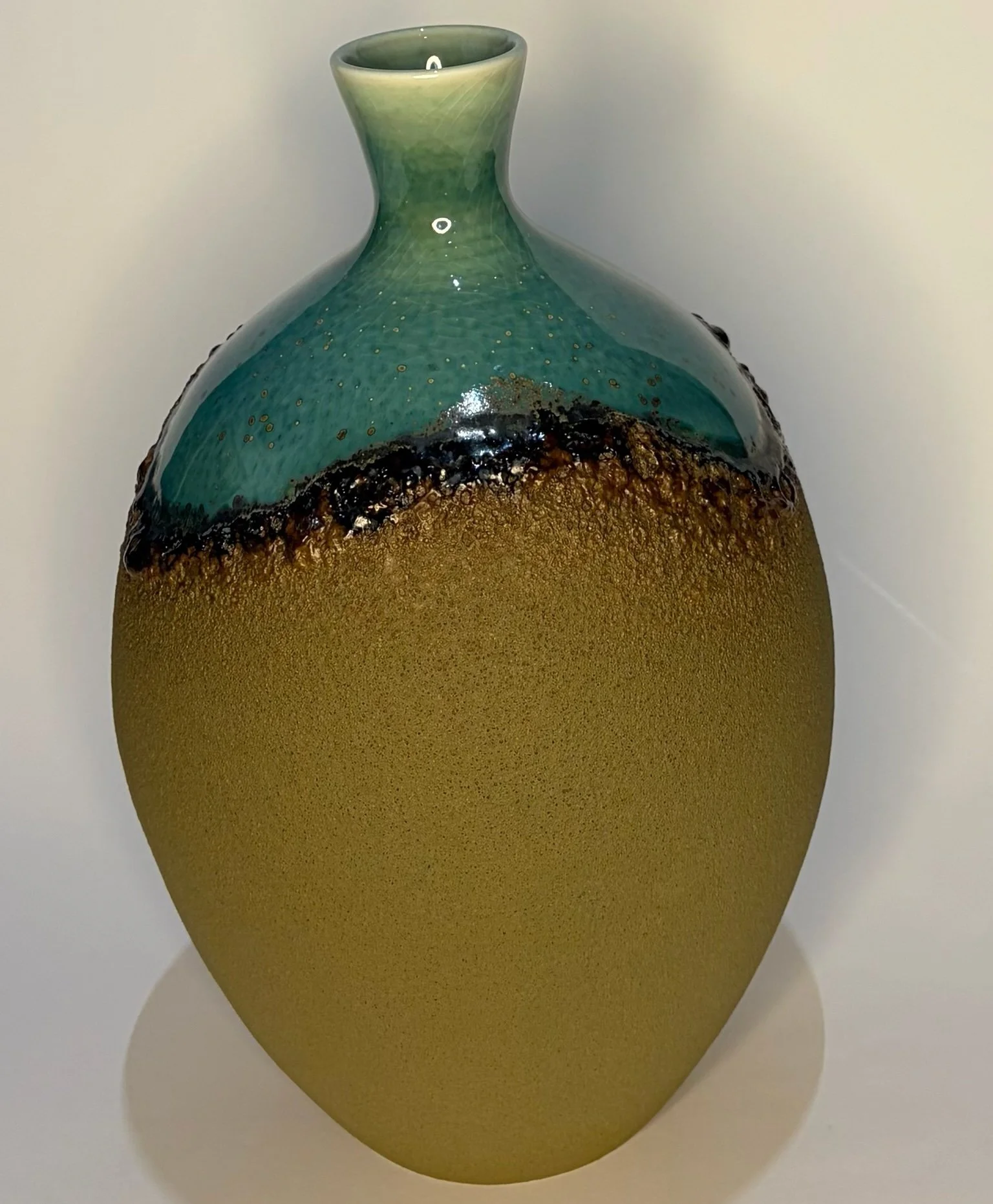 106-sandy vase with teal top.jpeg