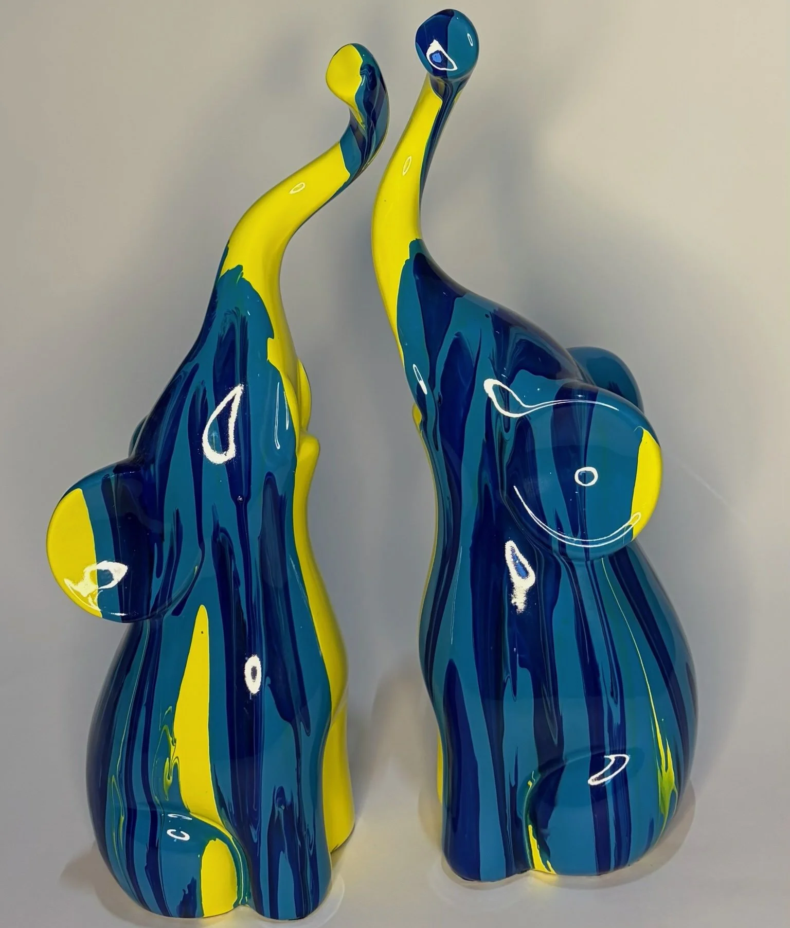 164-elephant fiberglass blue and yellow drip paint.jpeg