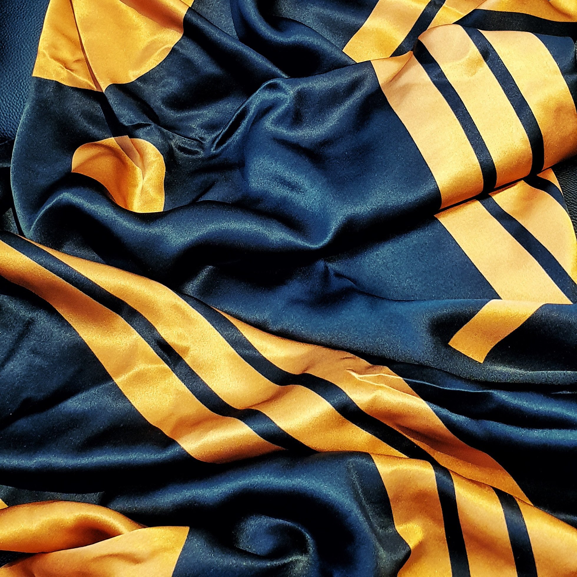 Pink and green retro lamp on a stool