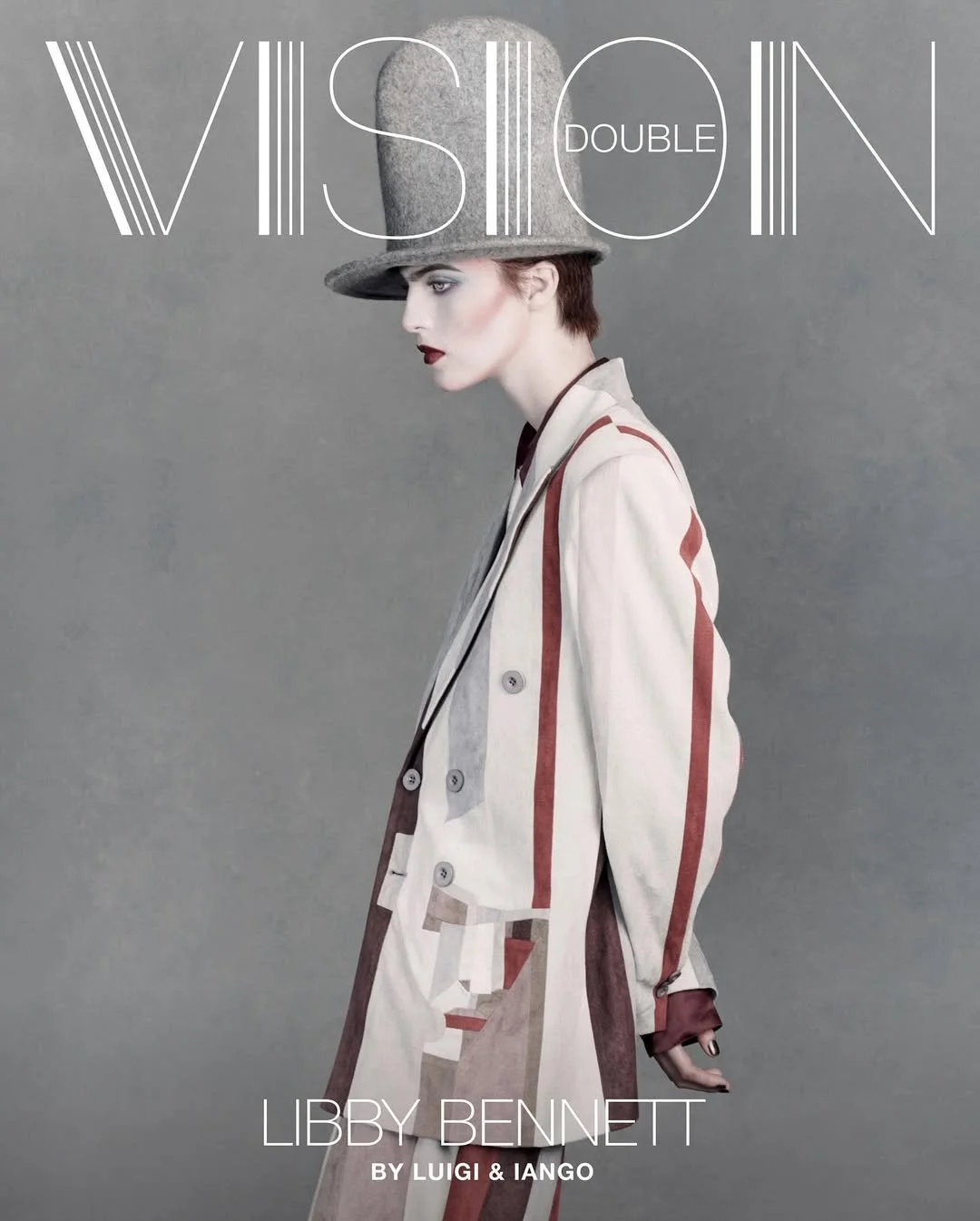 Fashion magazine cover featuring Libby Bennett wearing a wide-brimmed gray hat and beige coat with striped and abstract patterns, posed against a gray background.