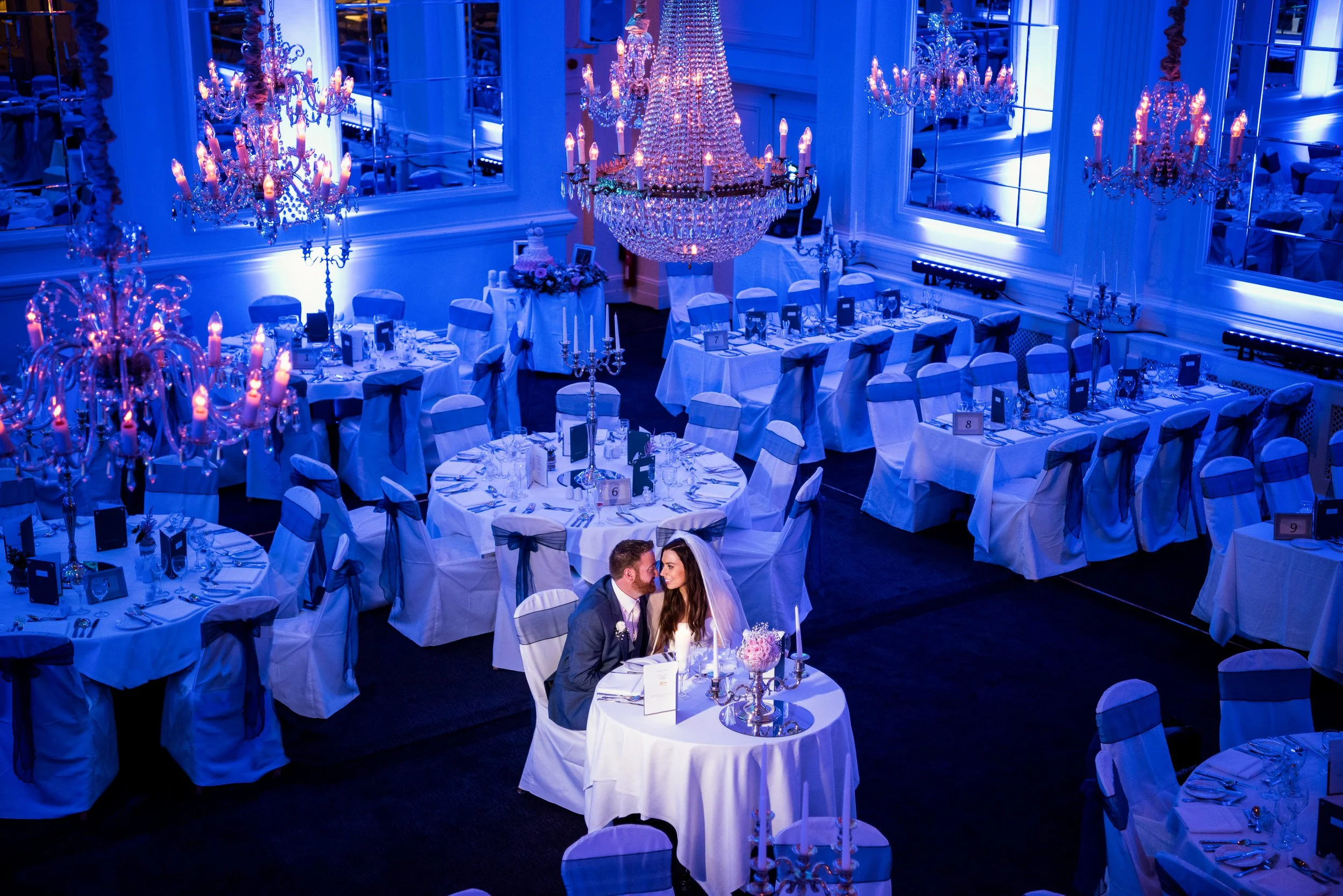 Wedding Photography Galway – stylized portrait at the reception with blue surrounding light at The Hardiman Hotel Eyre Square