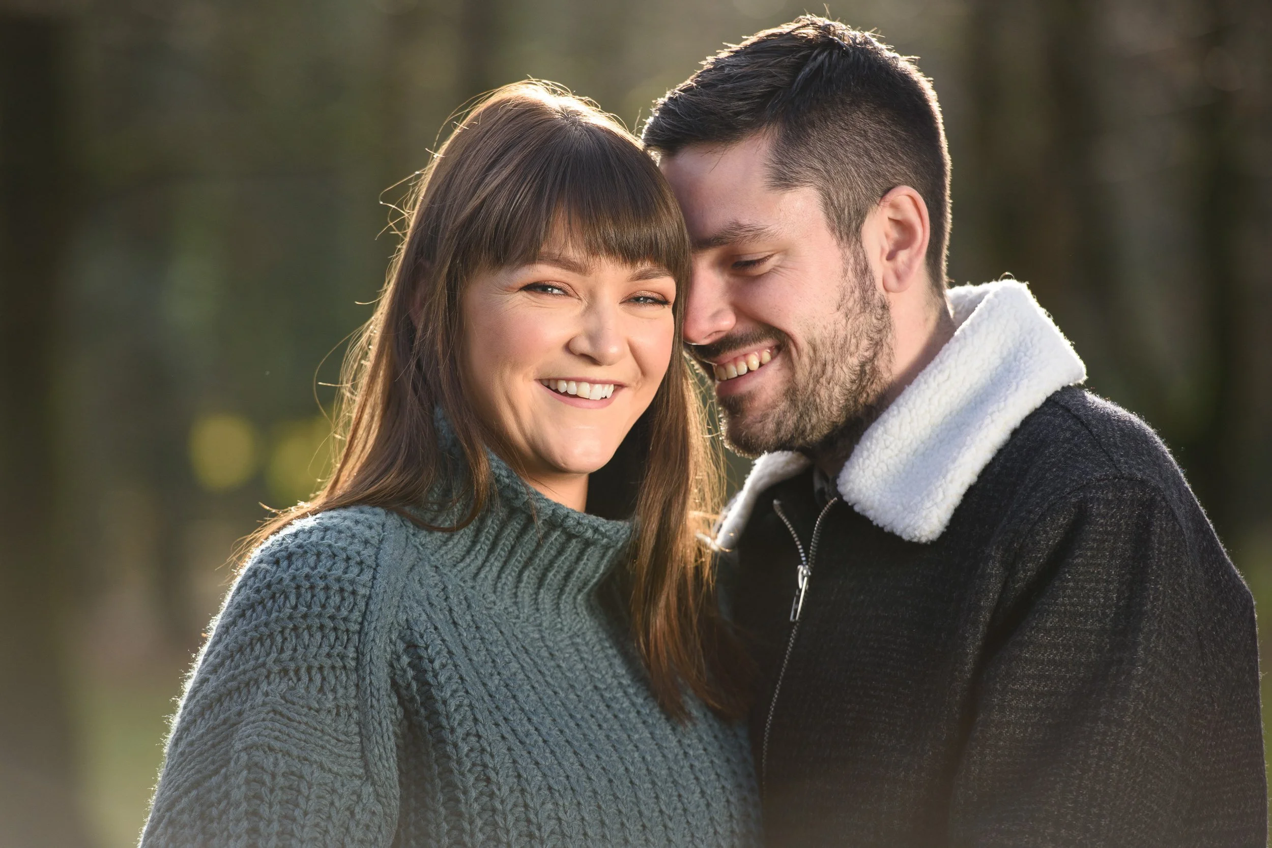 Engagement Photography Galway – couple seated with reflection at Coole Park Gort