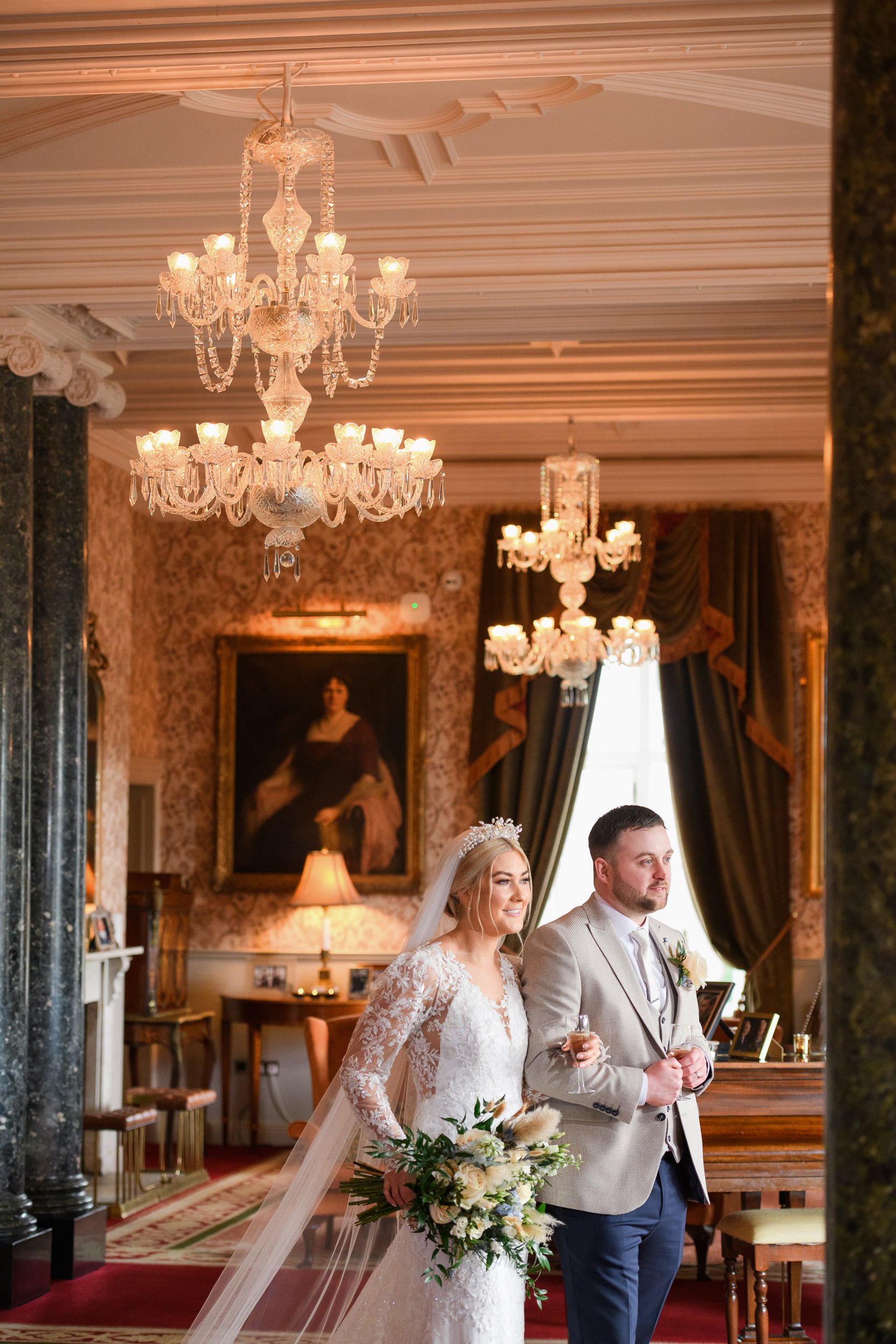 Wedding Photography Ireland – couple in elegant interior with chandeliers and classic styling at Markree Castle Ireland