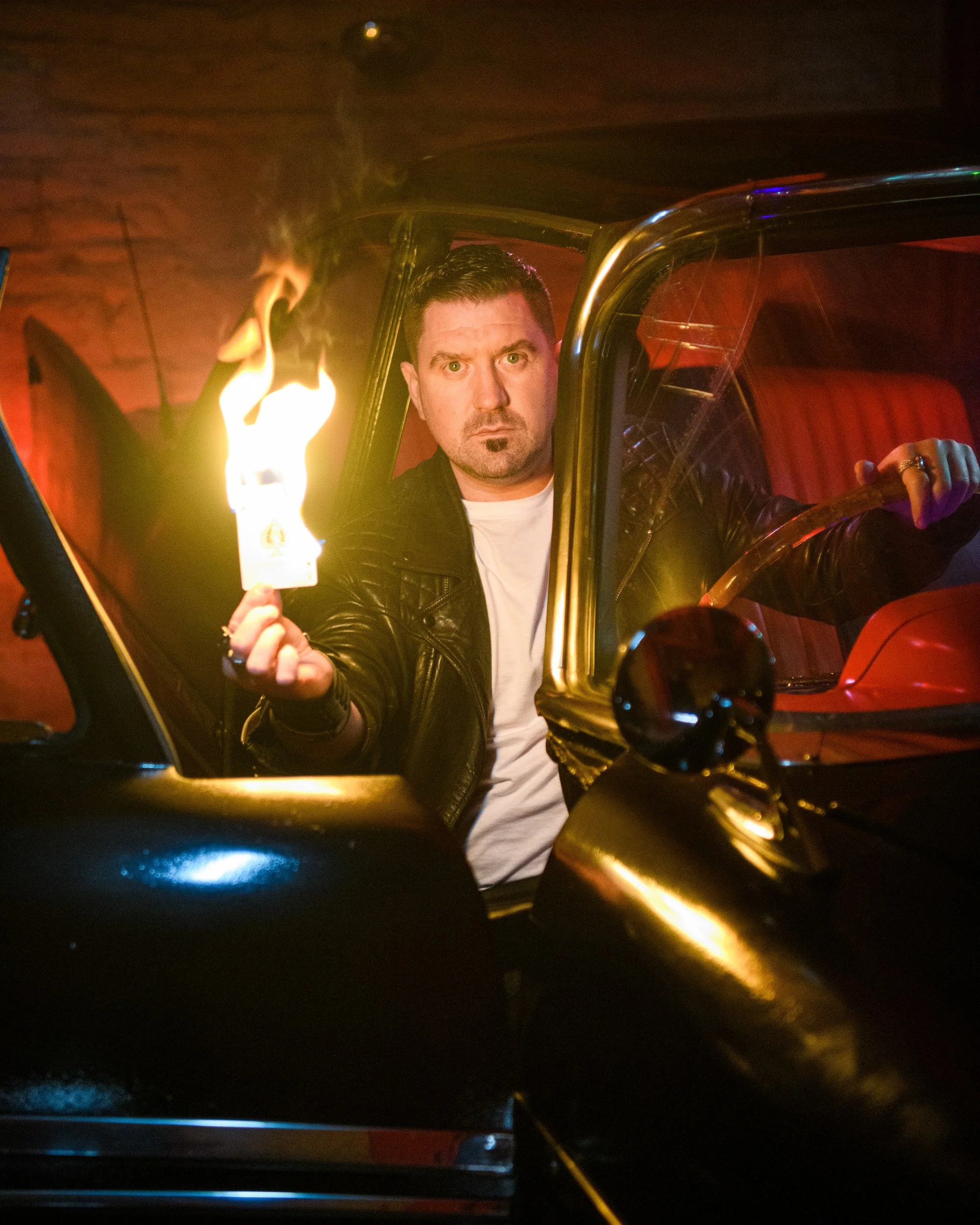 Editorial Portrait Photography Limerick – concept portrait with fire effect in car