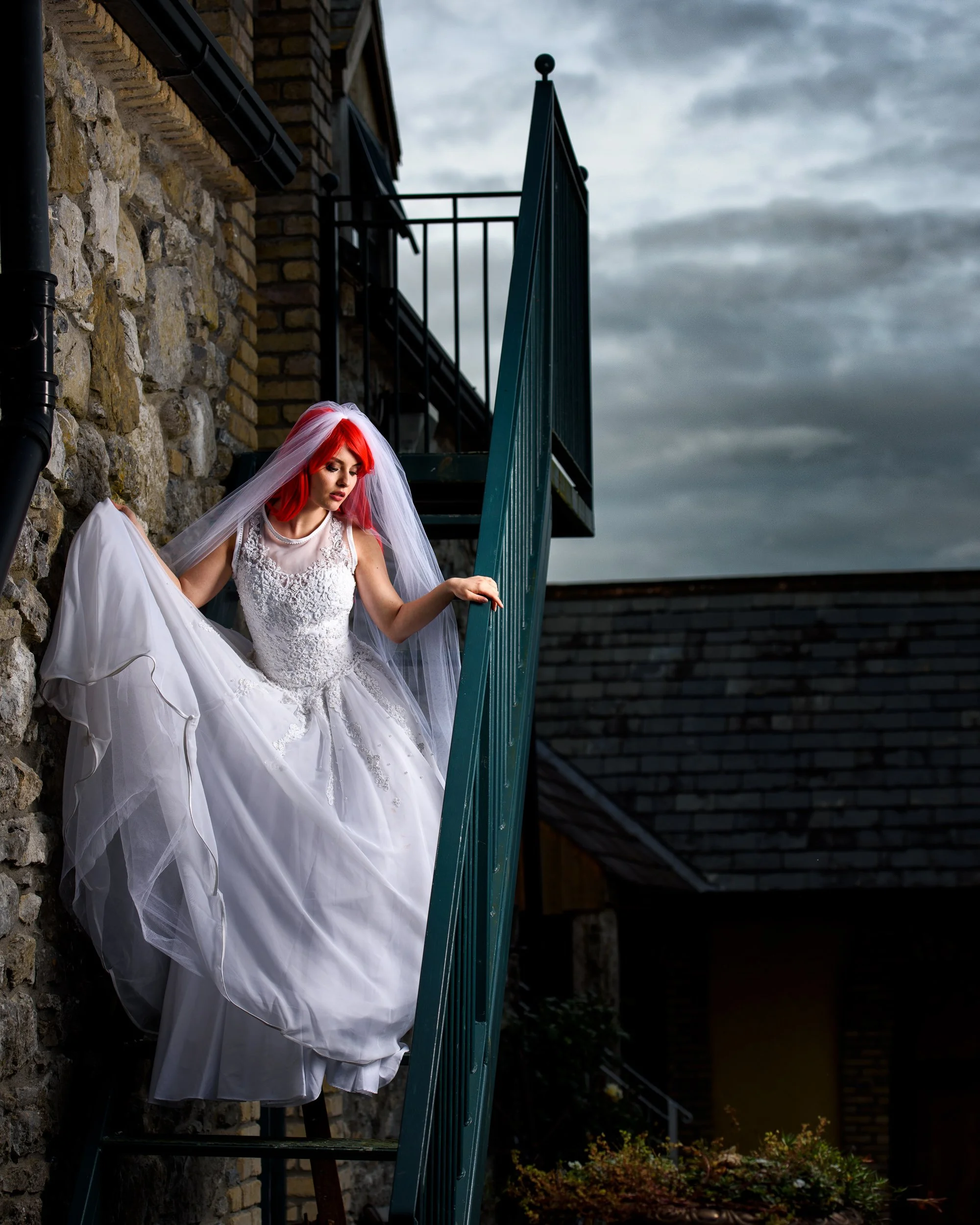 Wedding Photography Westmeath – bride portrait on staircase at Bishopstown House