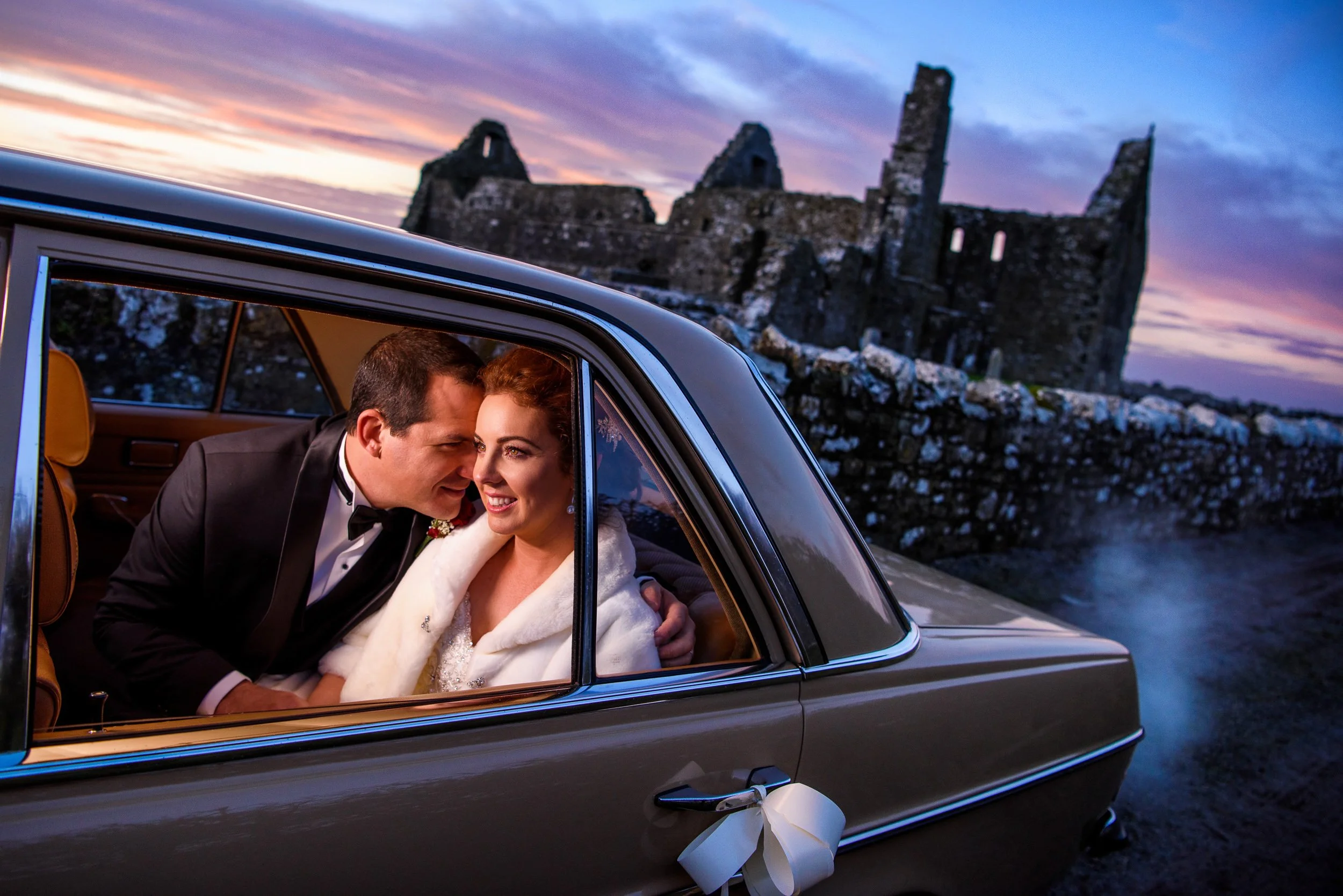 Wedding Photography Ballinasloe – couple portrait in vintage car at sunset near Shearwater Hotel