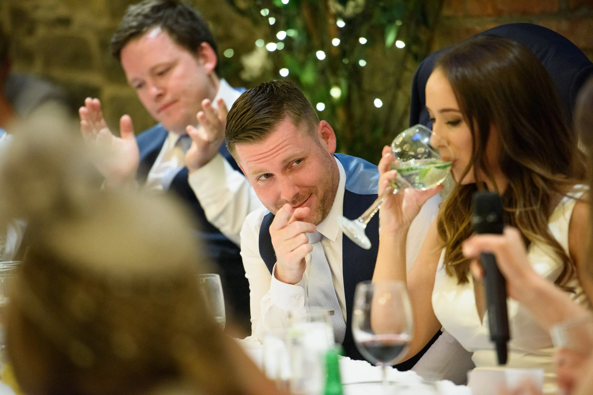 Wedding Photography Meath – candid guest reactions during reception at Ballymagarvey Village