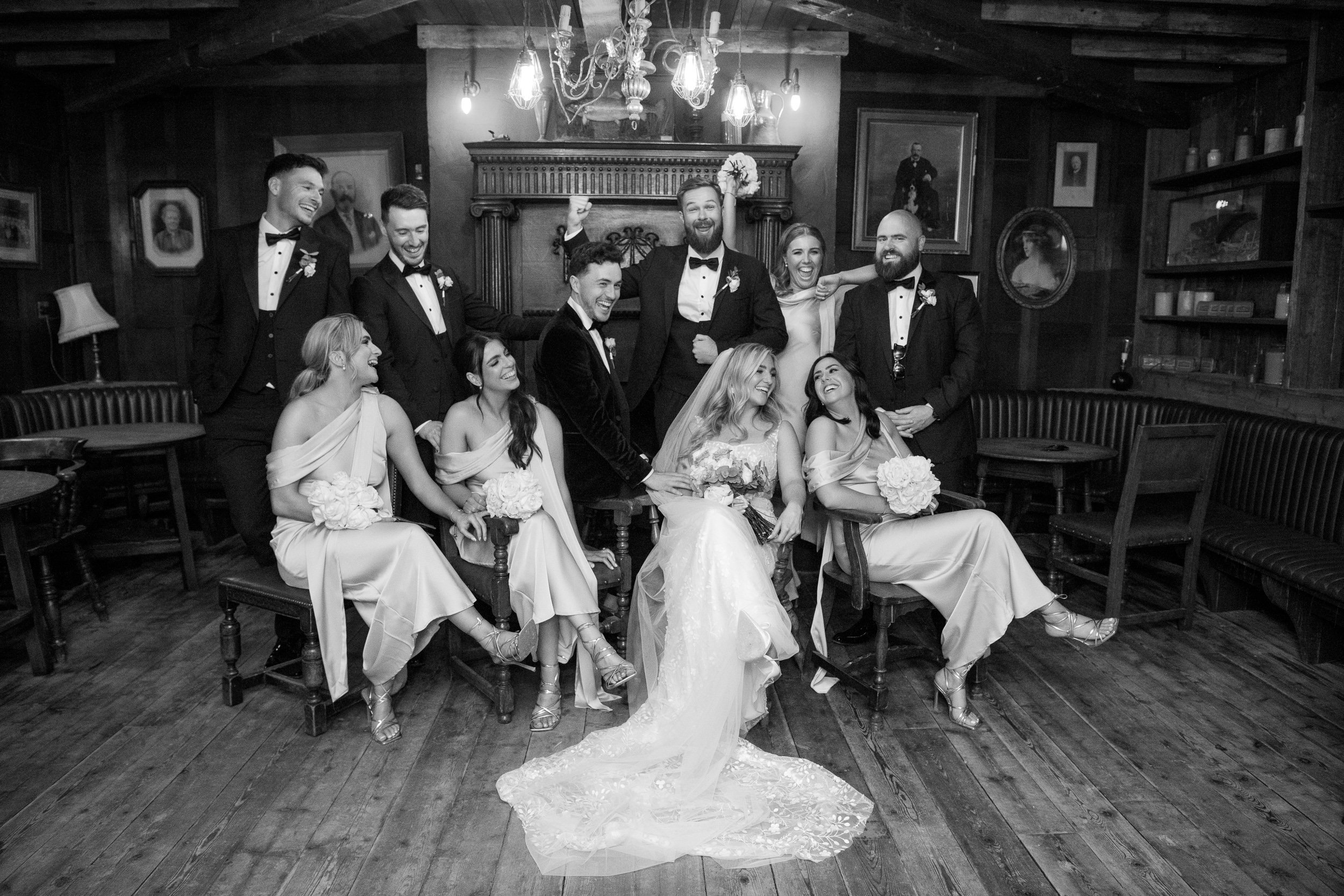 Wedding Photography Ireland – bridal party group portrait in vintage interior at Tom’s Bar, Glasson Lakehouse in Roscommon