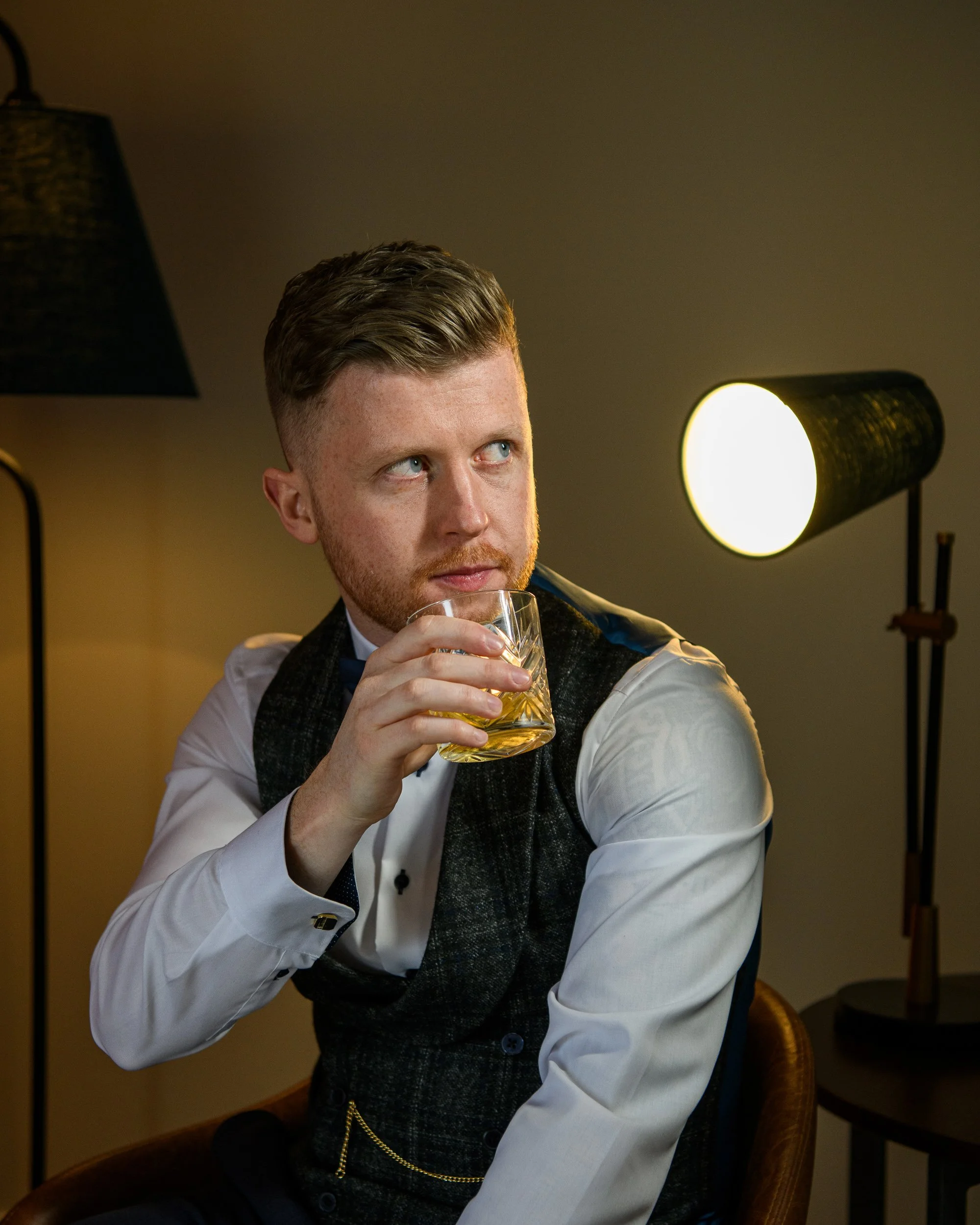 Wedding Photography Wicklow – groom portrait with moody lighting at Tulfarris Golf Resort