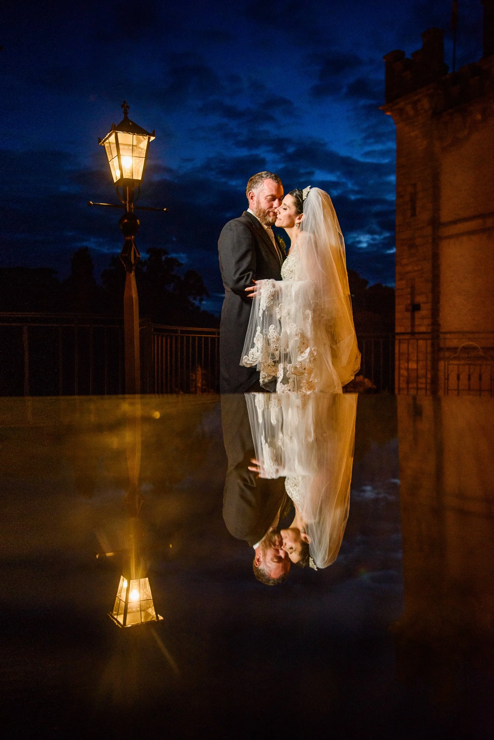 Wedding Photography Ireland – night portrait with reflections and cinematic lighting at Cabra Castle