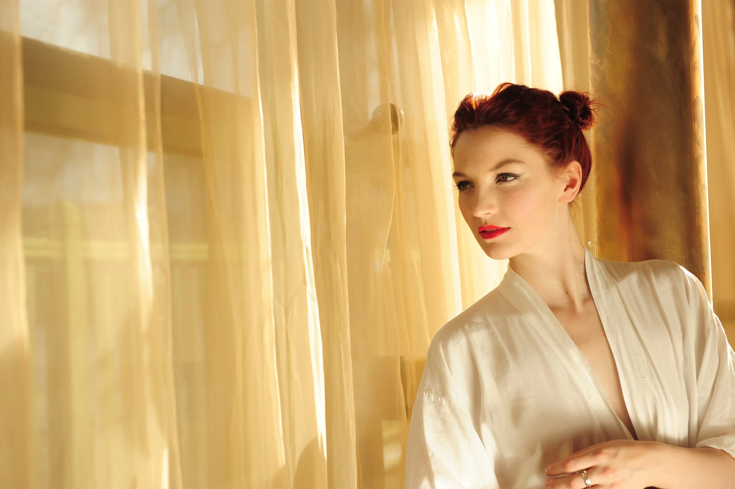 Bridal Preparation Photography Galway – bride in robe at Flannery’s Hotel