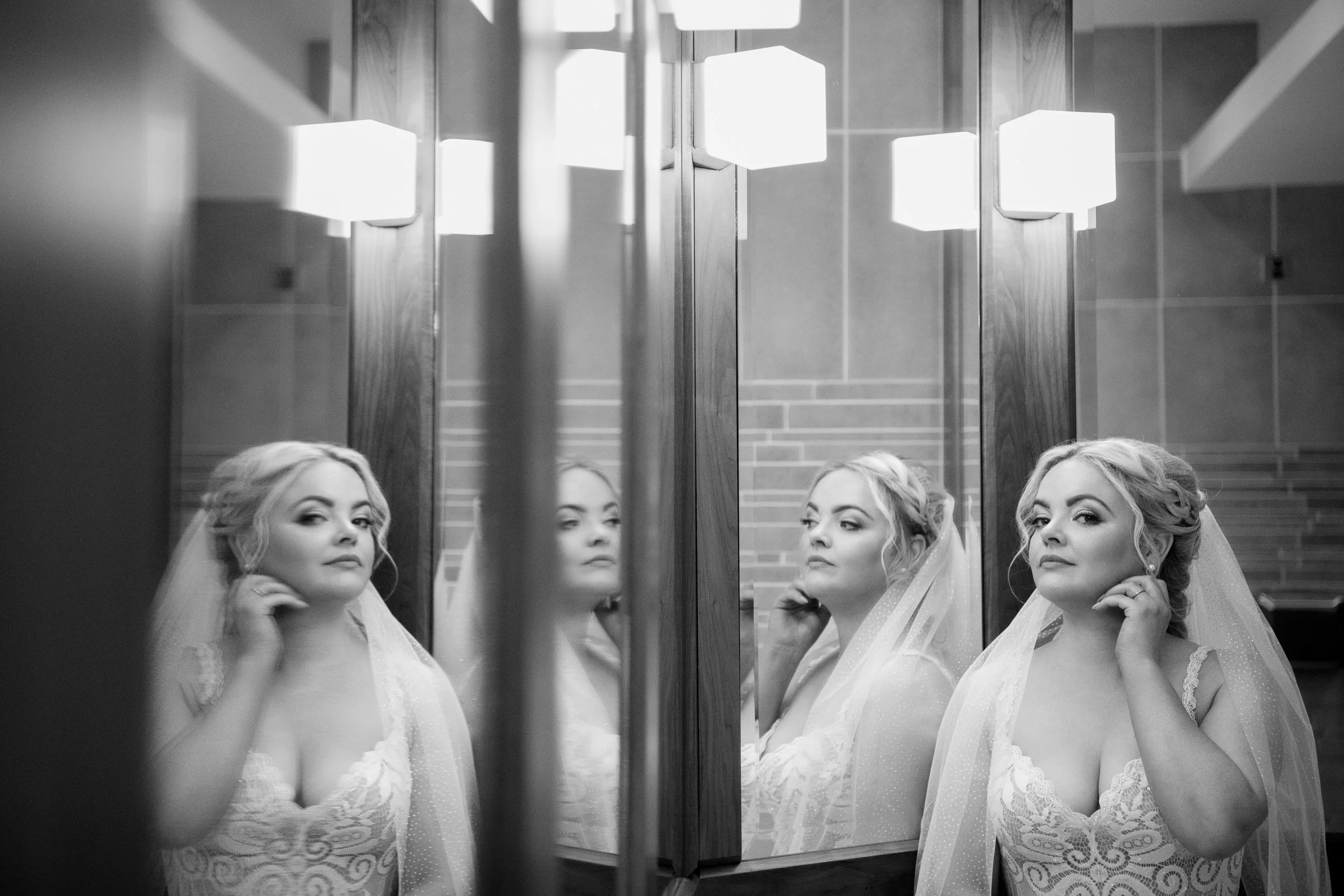 Wedding Photography Tullamore – bride preparing with mirror reflection at Court Hotel