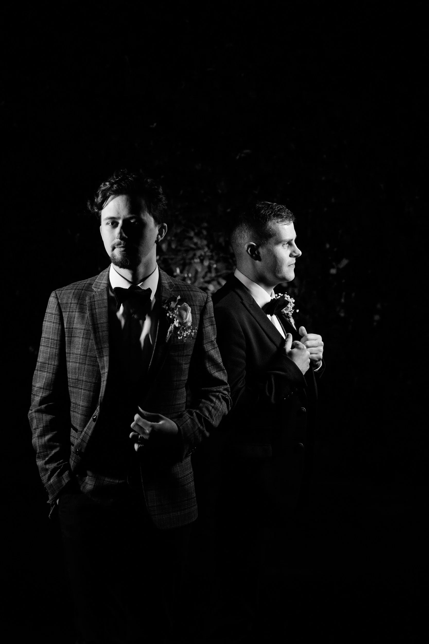 Groom Portrait Photography Ireland – black and white formal portrait with strong composition of Groom and Groomsman