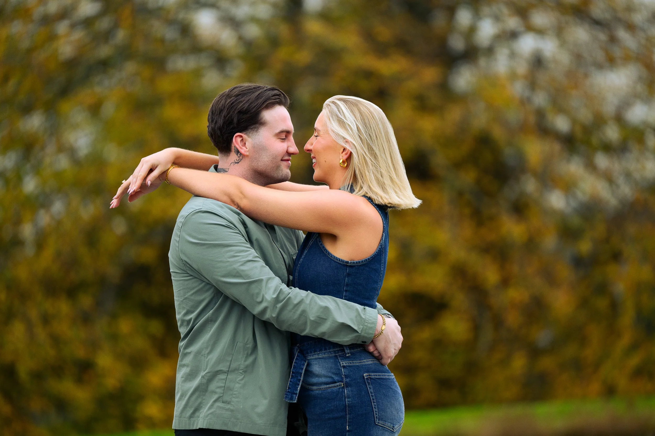 Engagement Photography Westmeath – couple embracing in autumn at Glasson Lakehouse