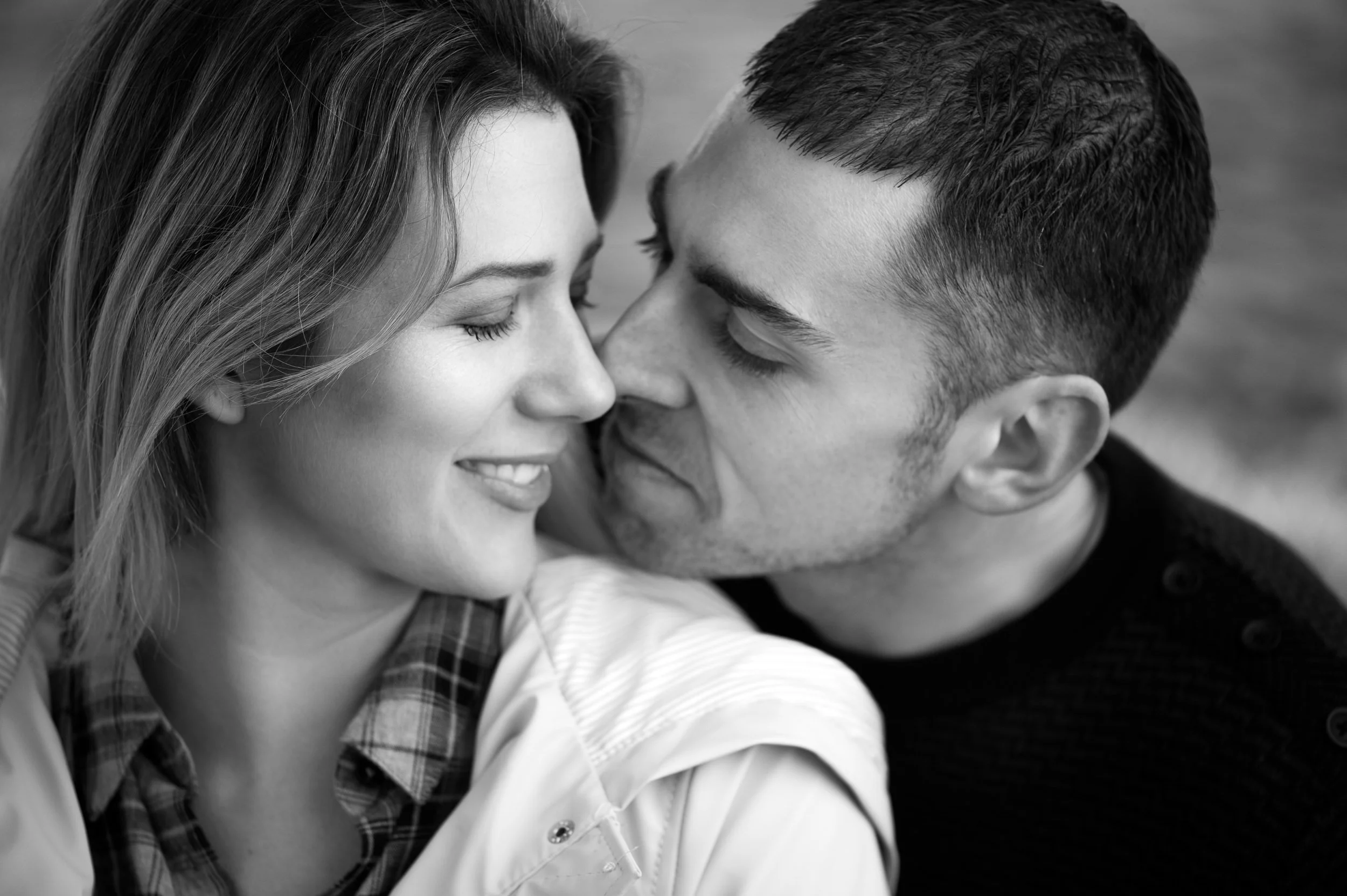 Engagement Photography Galway – black and white close-up couple portrait at Claddagh