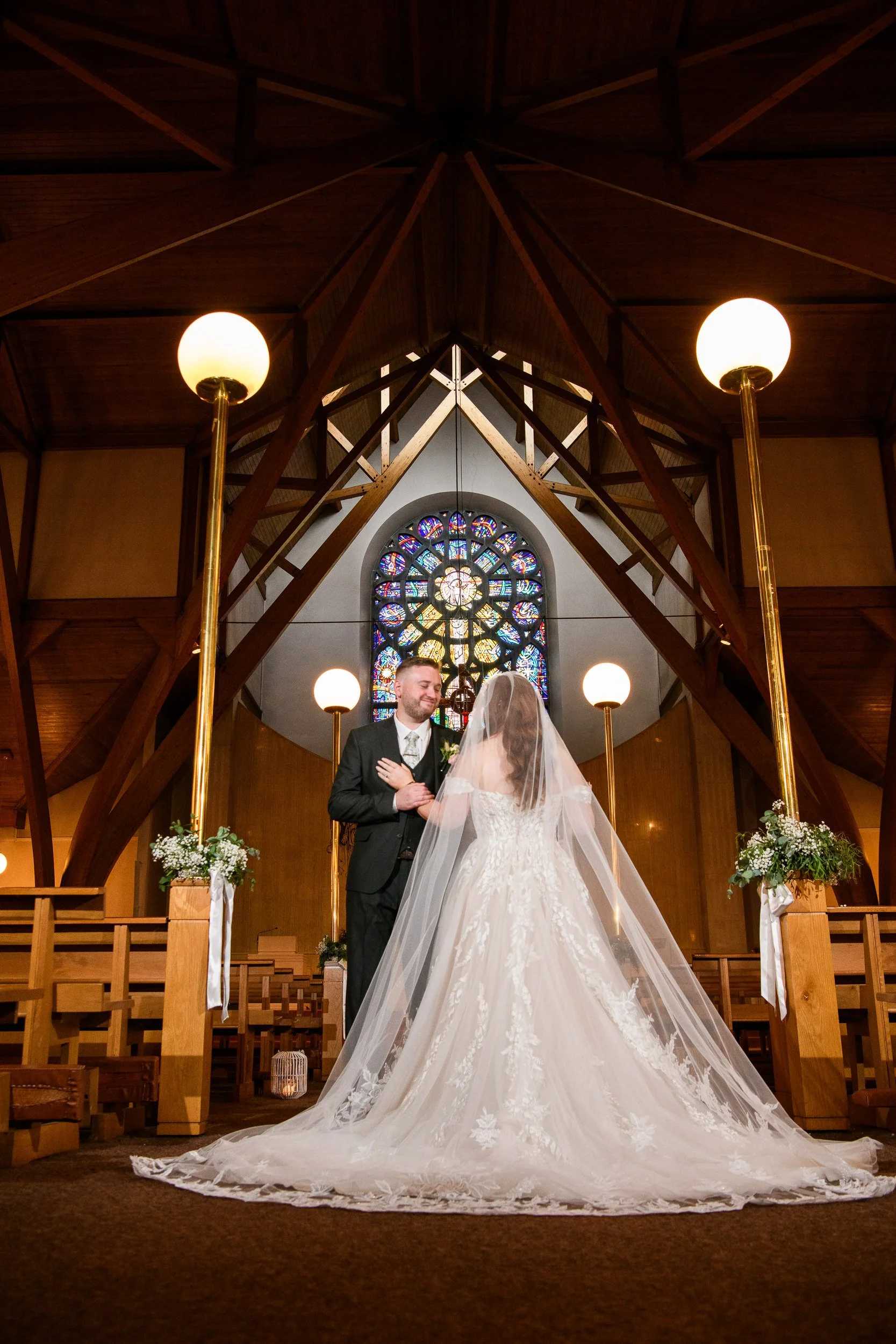 Wedding Photographer Ireland – ceremony inside Tullamore Parish church with stained glass and natural light